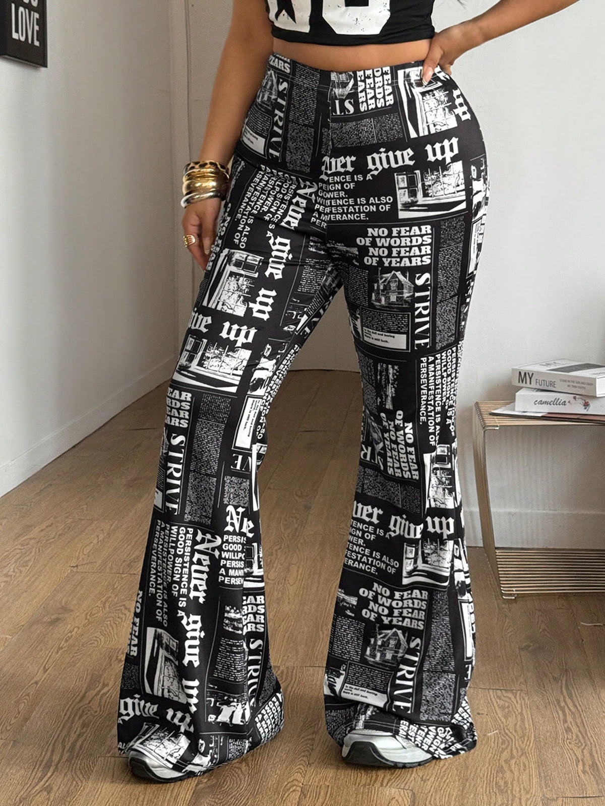Women's plus size black flare leg pants with high elastic waist in stretchy knit fabric