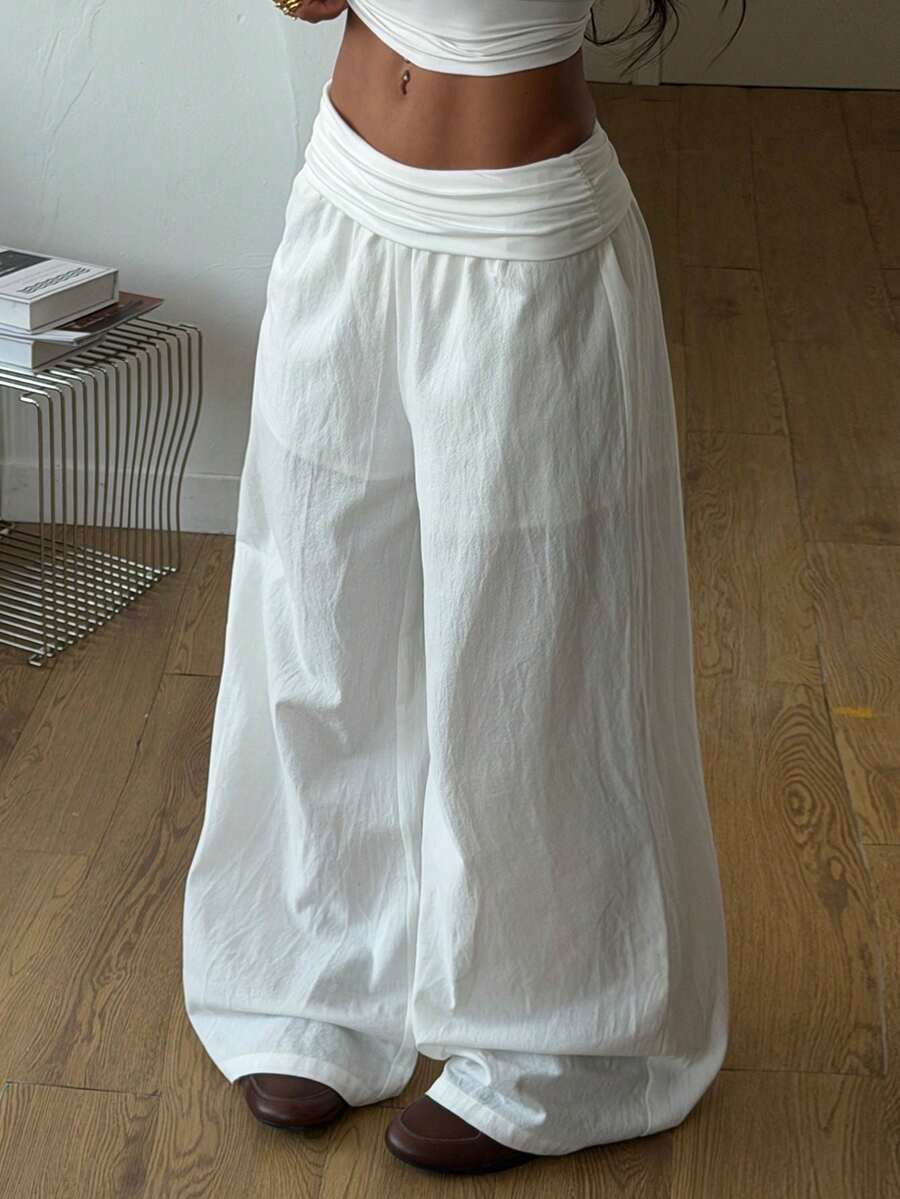 Women's plus size wide leg cotton pants featuring a relaxed loose fit and high waist design.