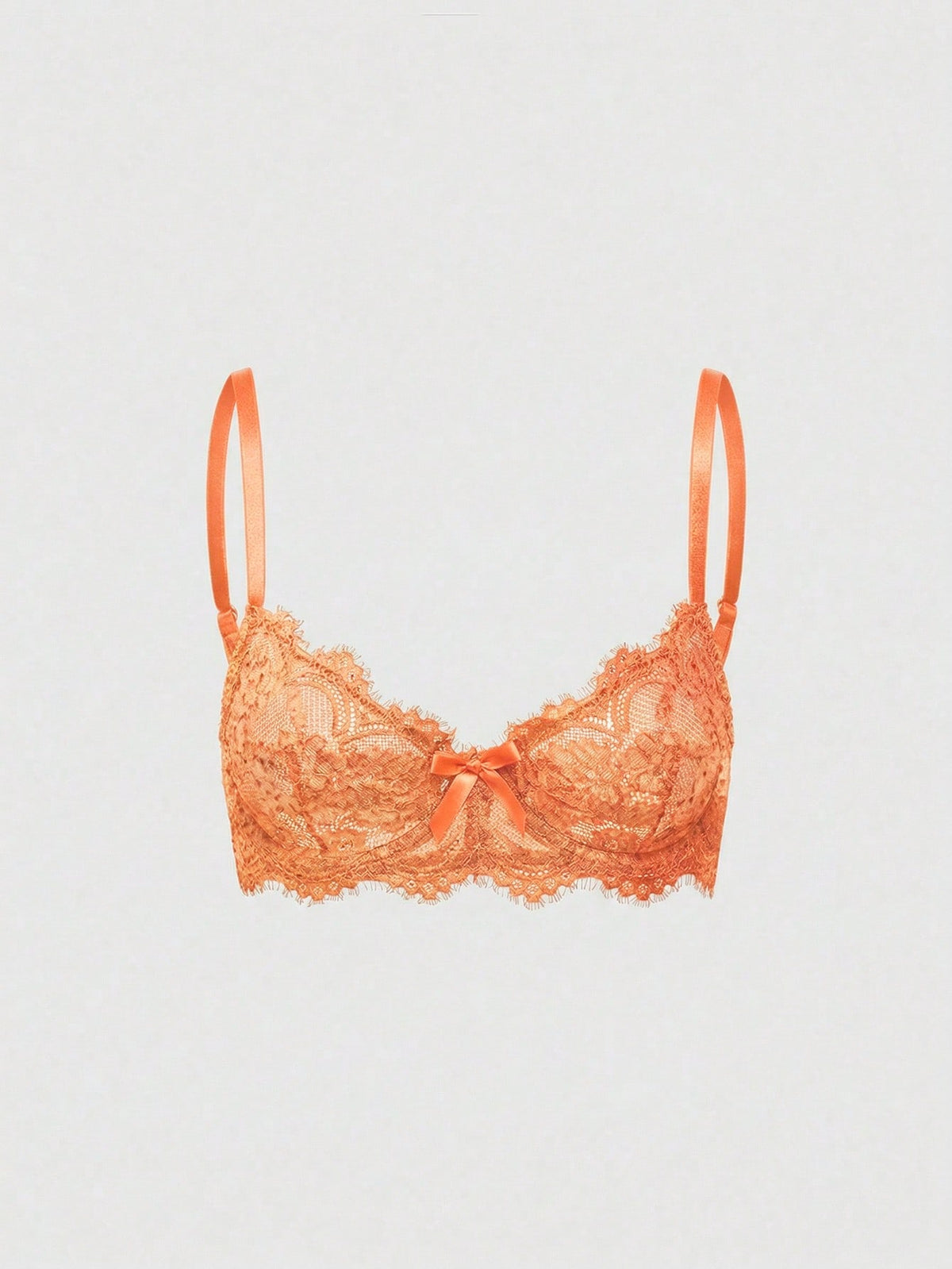 Sheer floral lace underwire triangle bra for women featuring adjustable straps and plunge cup design.