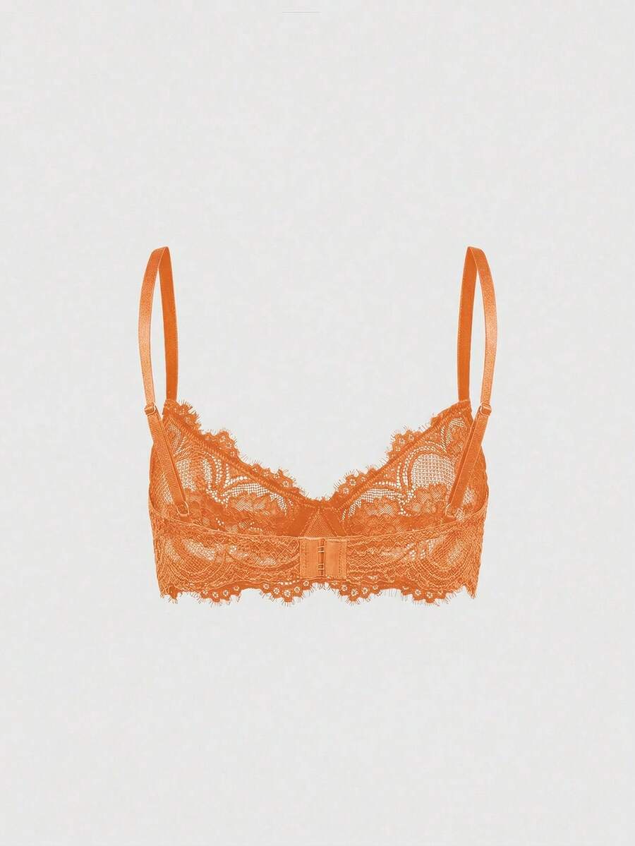 Sheer floral lace underwire triangle bra for women featuring adjustable straps and plunge cup design.