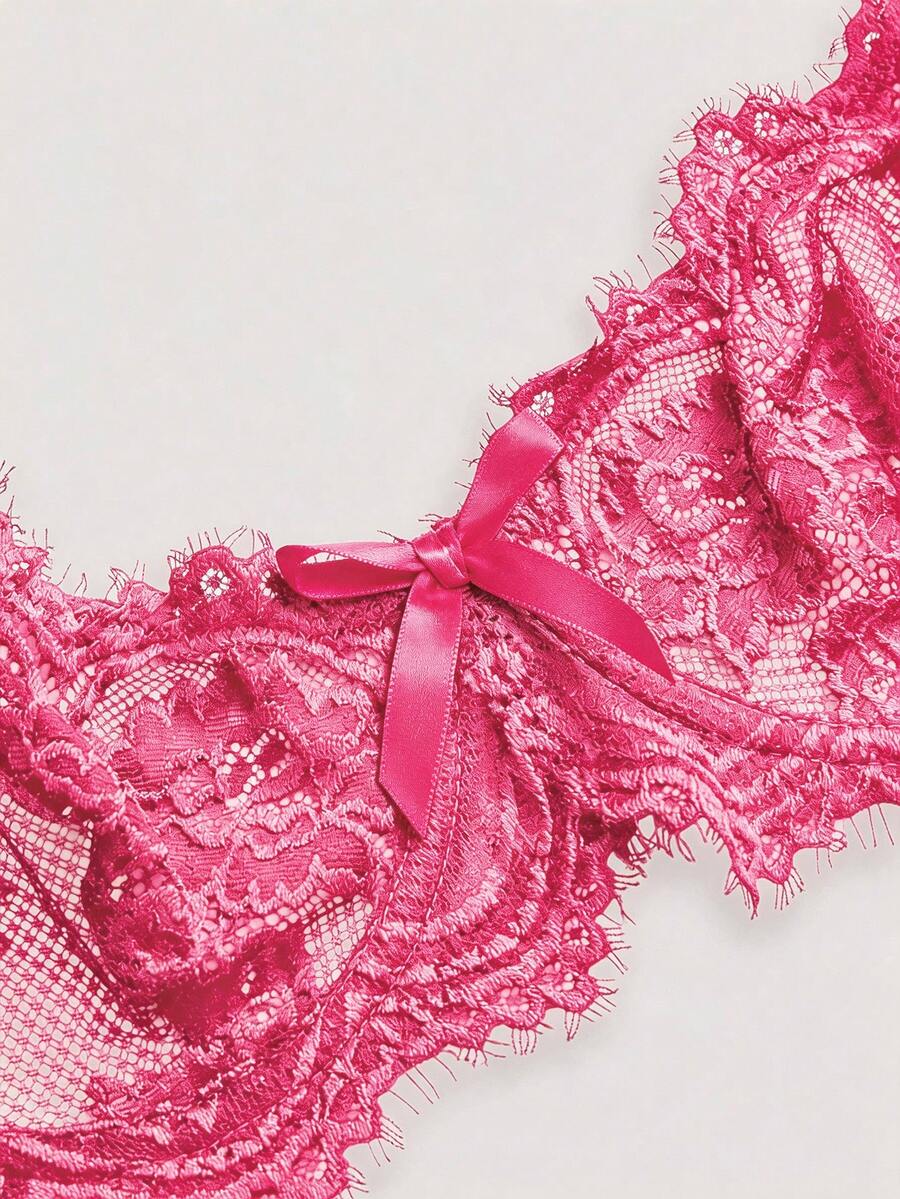 Sheer floral lace underwire triangle bra for women featuring adjustable straps and plunge cup design.
