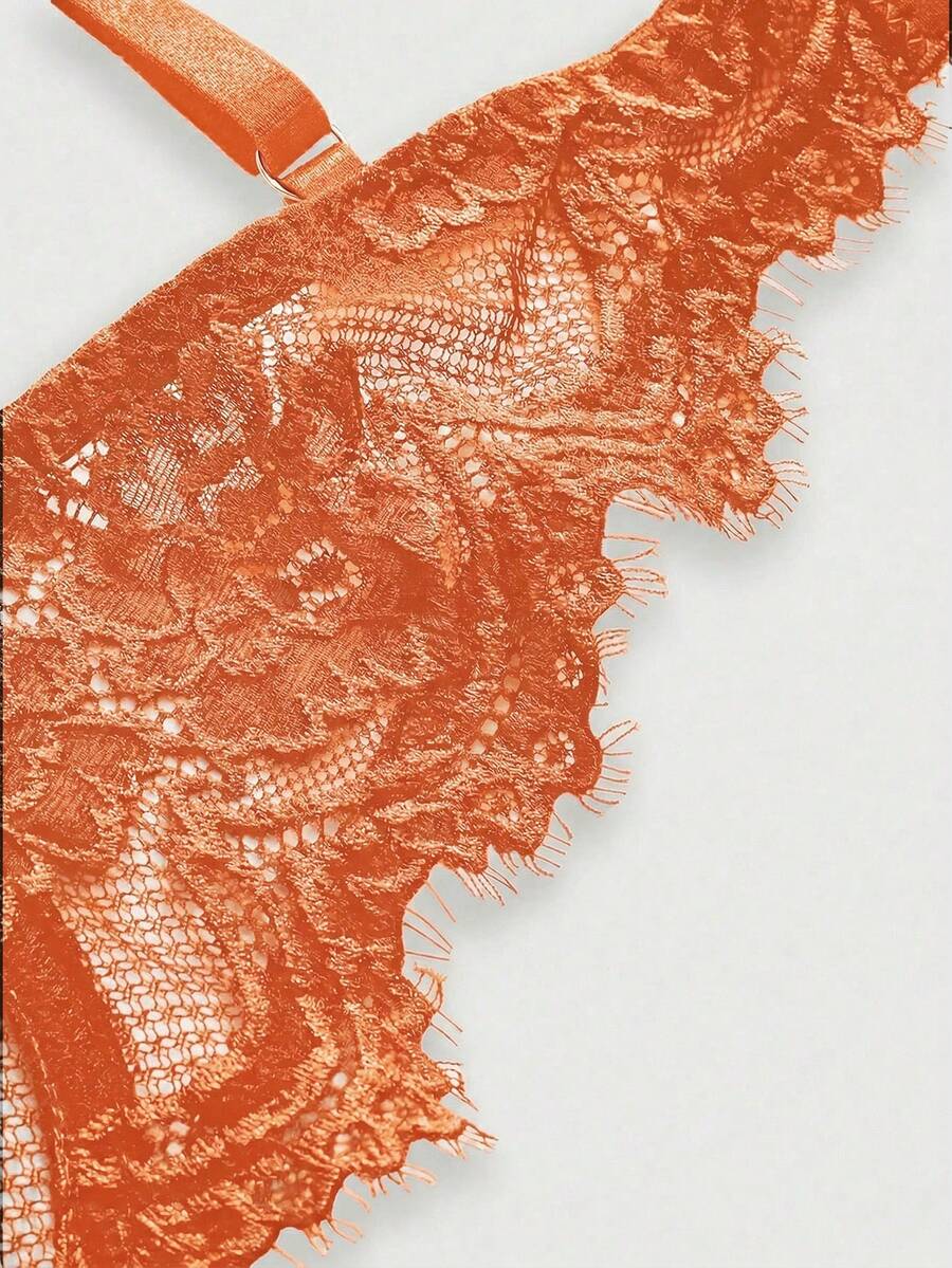 Sheer floral lace underwire triangle bra for women featuring adjustable straps and plunge cup design.