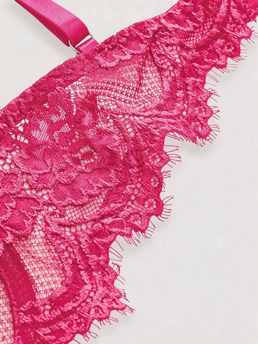 Sheer floral lace underwire triangle bra for women featuring adjustable straps and plunge cup design.