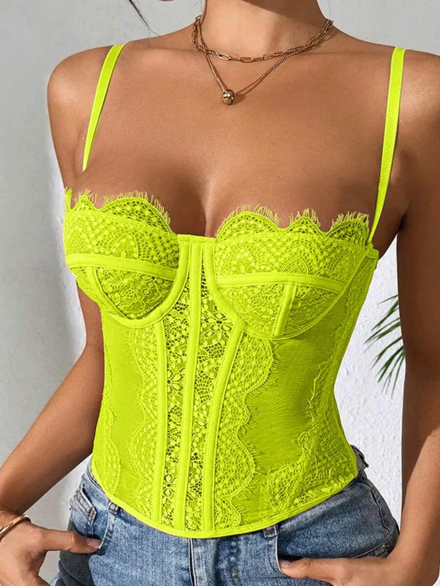 Women's lace bustier corset cami top with spaghetti straps, arm sleeves, asymmetrical contrast lace detail, and buckle accent