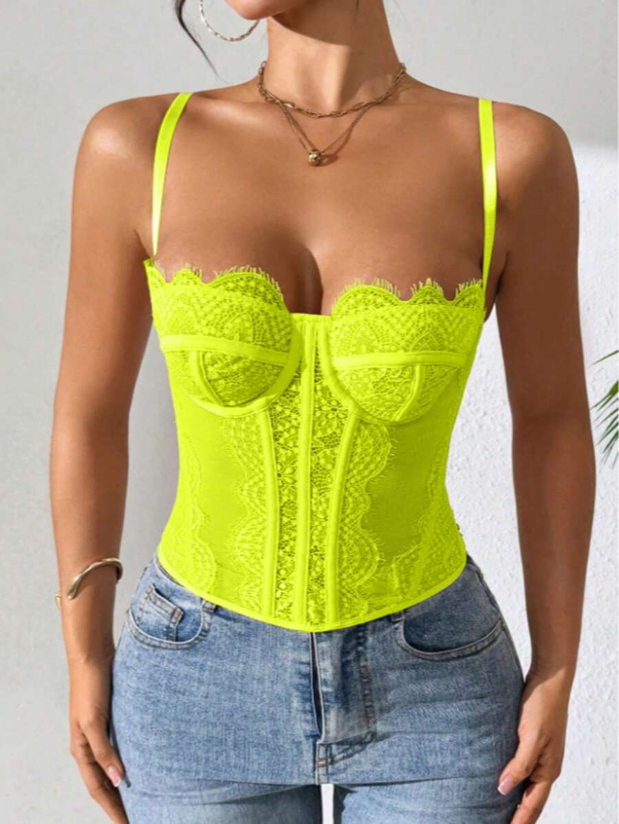Women's lace bustier corset cami top with spaghetti straps, arm sleeves, asymmetrical contrast lace detail, and buckle accent