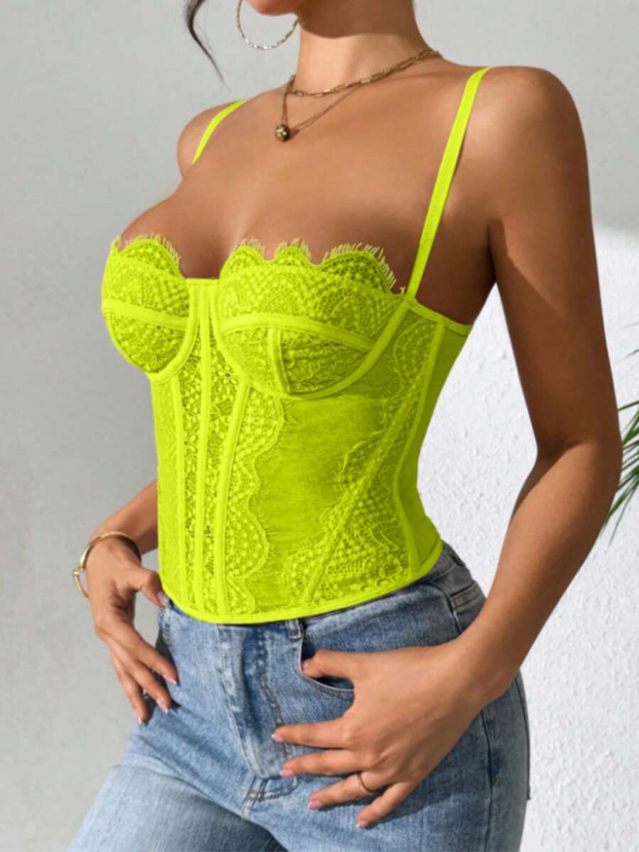 Women's lace bustier corset cami top with spaghetti straps, arm sleeves, asymmetrical contrast lace detail, and buckle accent