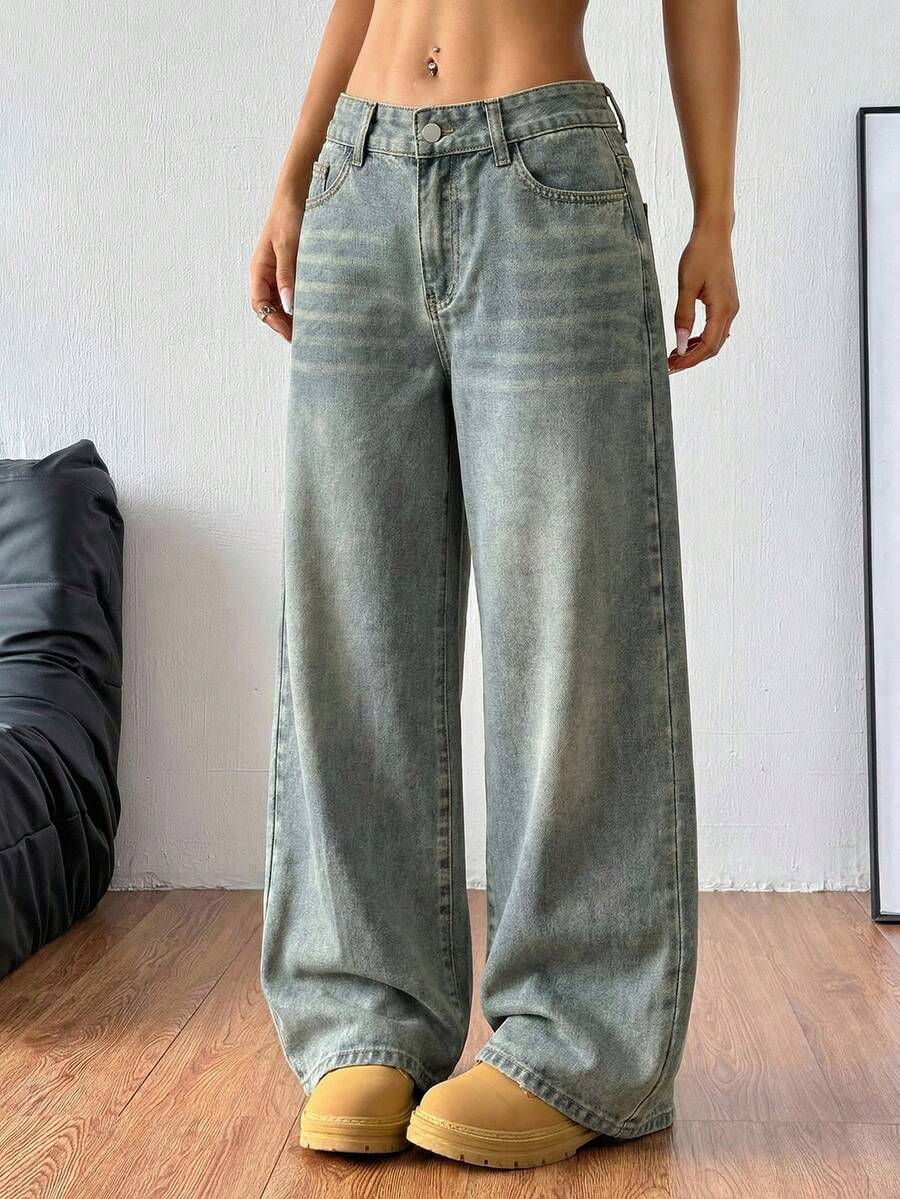 Women's loose wide-leg jeans in light wash denim with low waist and extra-long relaxed fit
