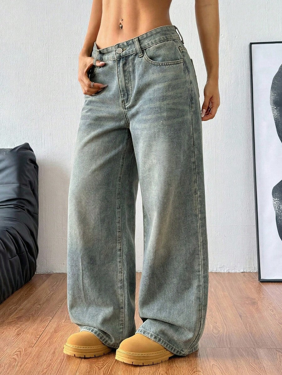 Women's loose wide-leg jeans in light wash denim with low waist and extra-long relaxed fit
