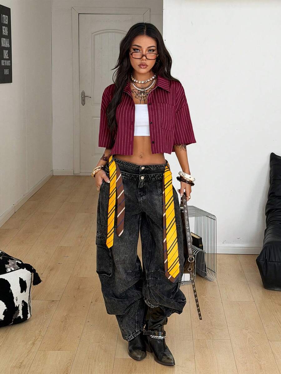 Women's plaid crop shirt with button front, chest pocket, short sleeves, and loose casual fit.