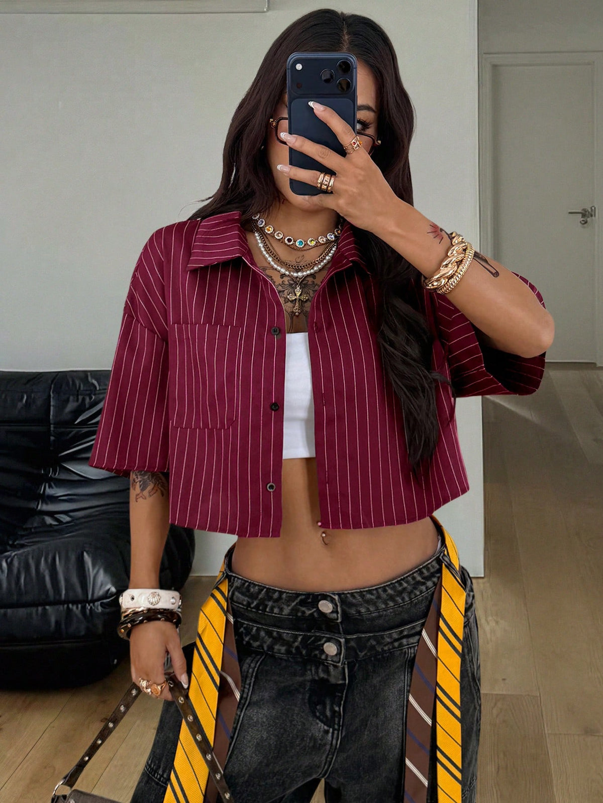 Women's plaid crop shirt with button front, chest pocket, short sleeves, and loose casual fit.