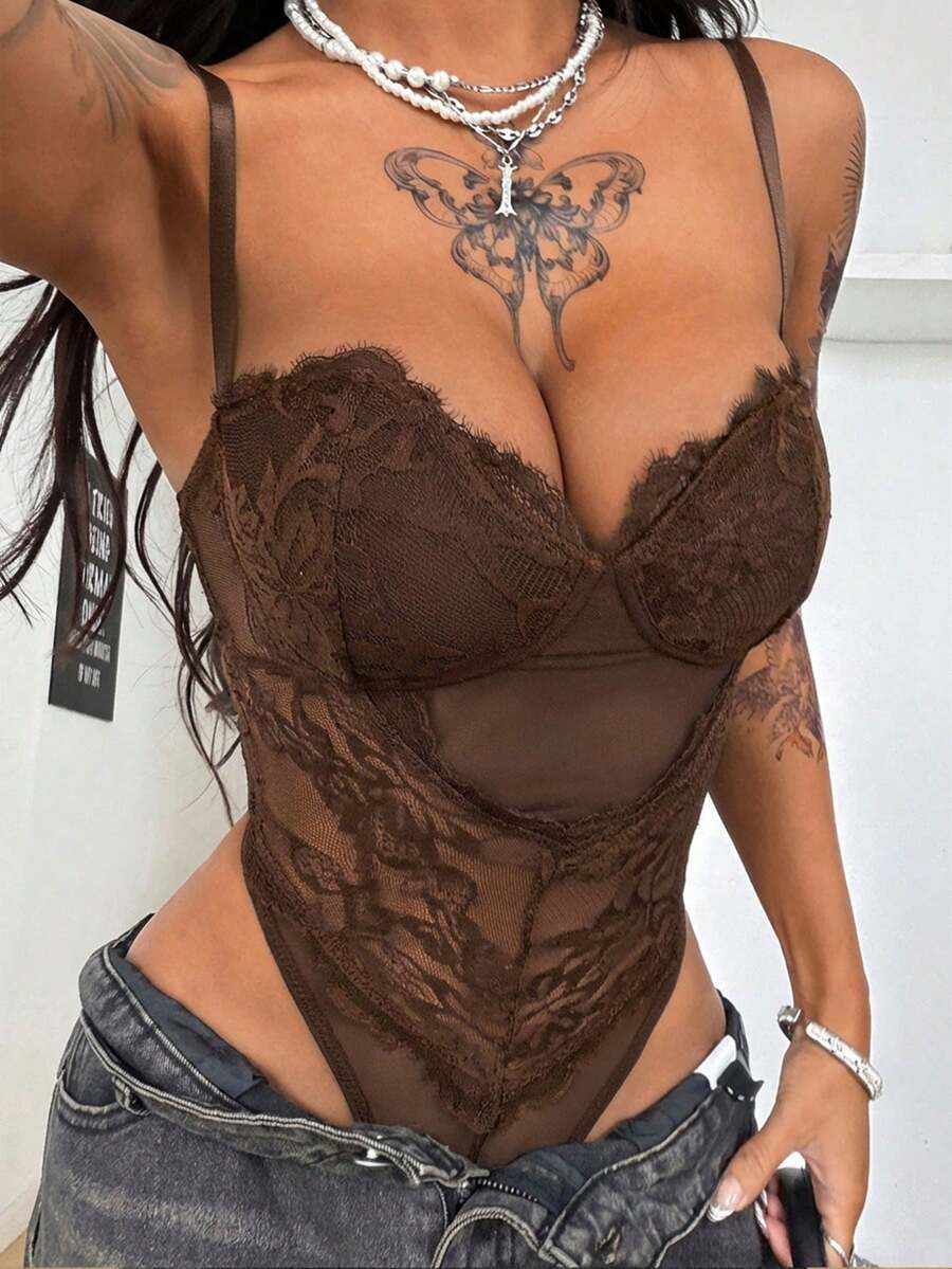 Fitted women's lace and mesh cami bodysuit with spaghetti straps.