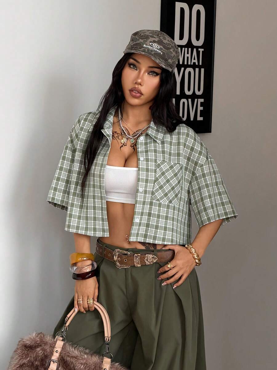 Women's plaid crop shirt with button front, chest pocket, short sleeves, and loose casual fit.