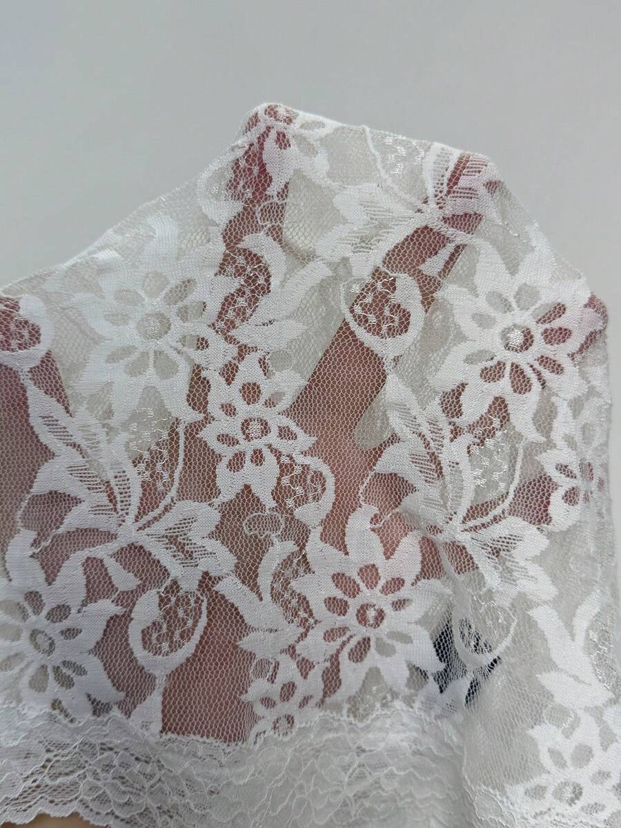 Slim fit cropped camisole top for women featuring contrast lace trim, ruched cup detailing, and delicate spaghetti straps.