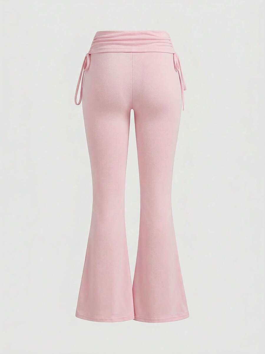 Women's low waist flare leg pants featuring an elastic drawstring waistband and ruched detail in knitted fabric.