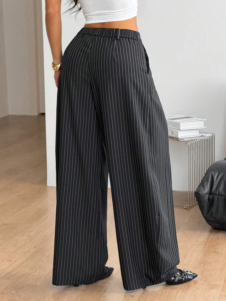 Casual black striped woven long pants for women featuring a low waist and loose fit design.