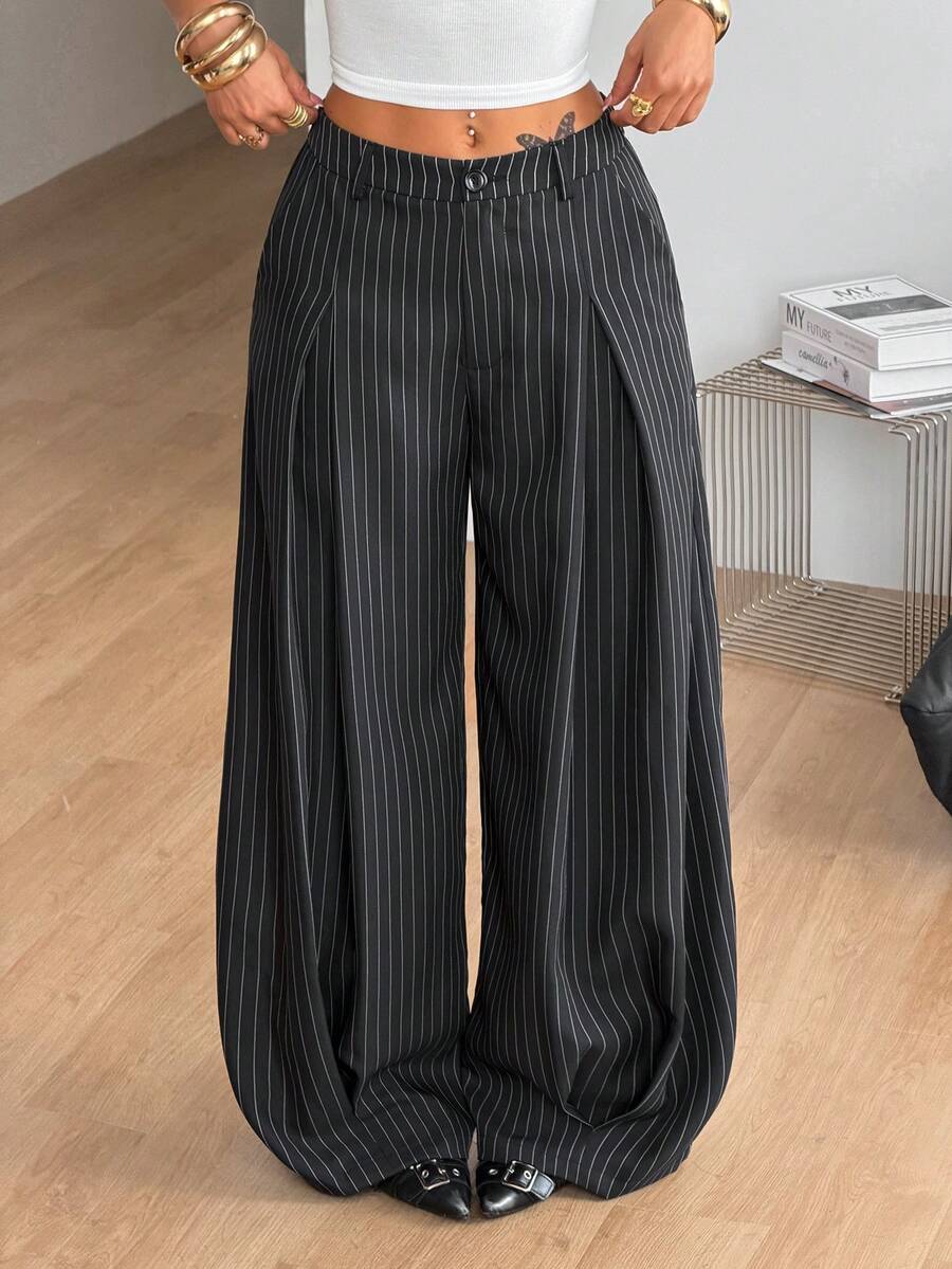 Casual black striped woven long pants for women featuring a low waist and loose fit design.