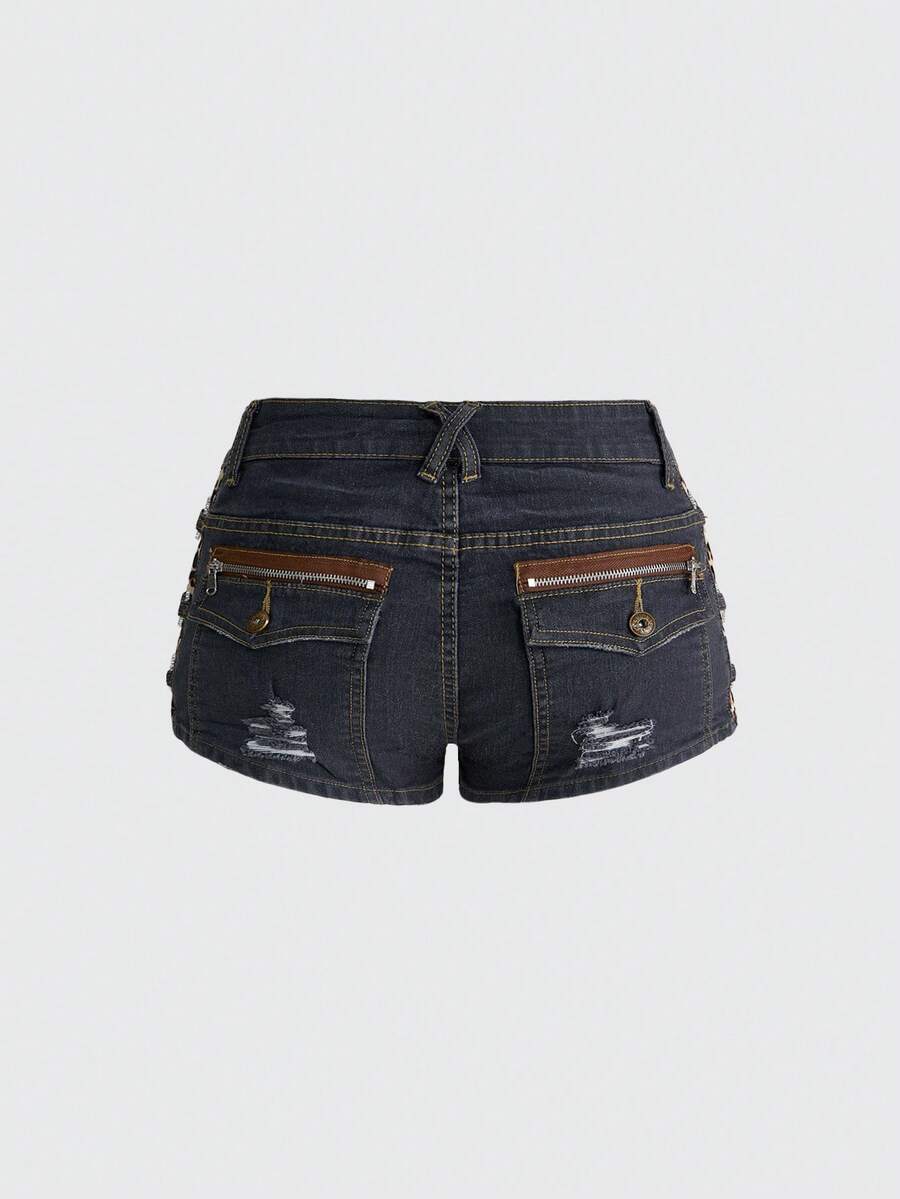 Women's ultra low waist vintage Y2K leopard print skinny mini shorts featuring ripped details, button, and zipper fly.