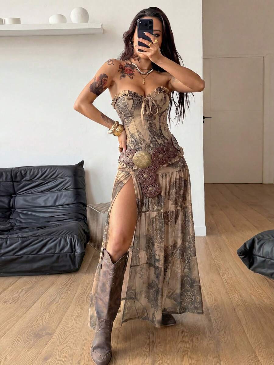 Women's low rise flared long skirt featuring an all-over print, split thigh accent, and textured semi-sheer fabric.