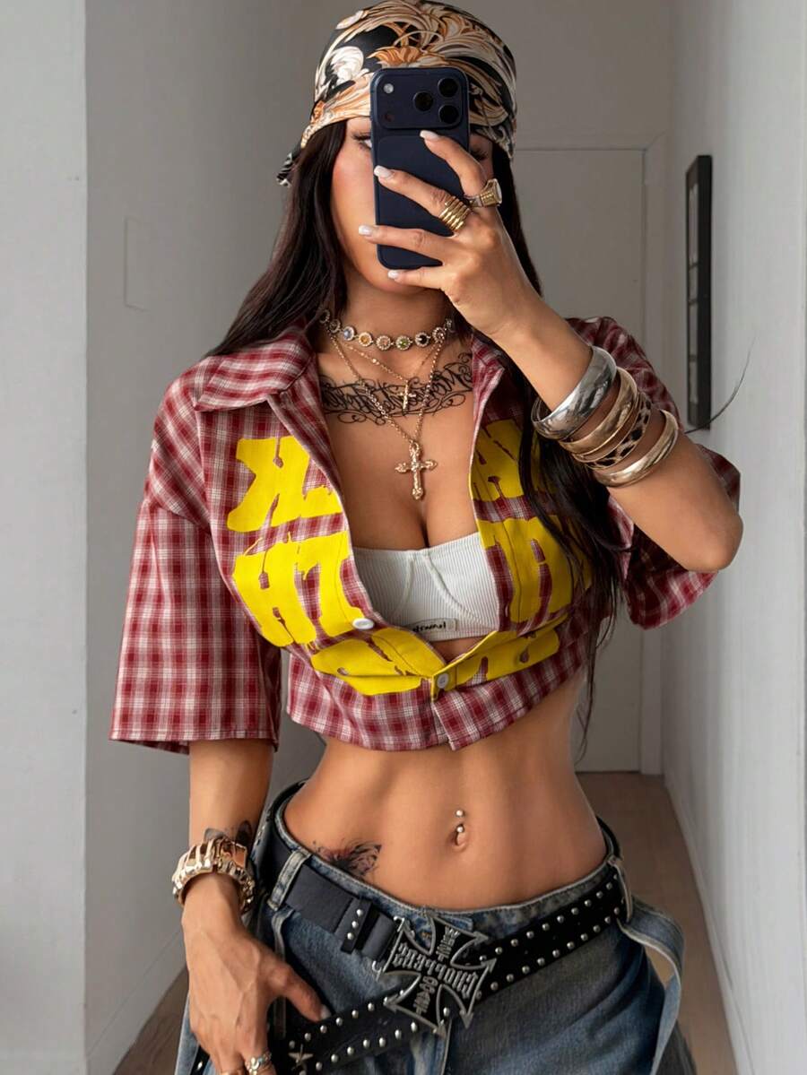 Women's plaid crop shirt with button front, chest pocket, short sleeves, and loose casual fit.