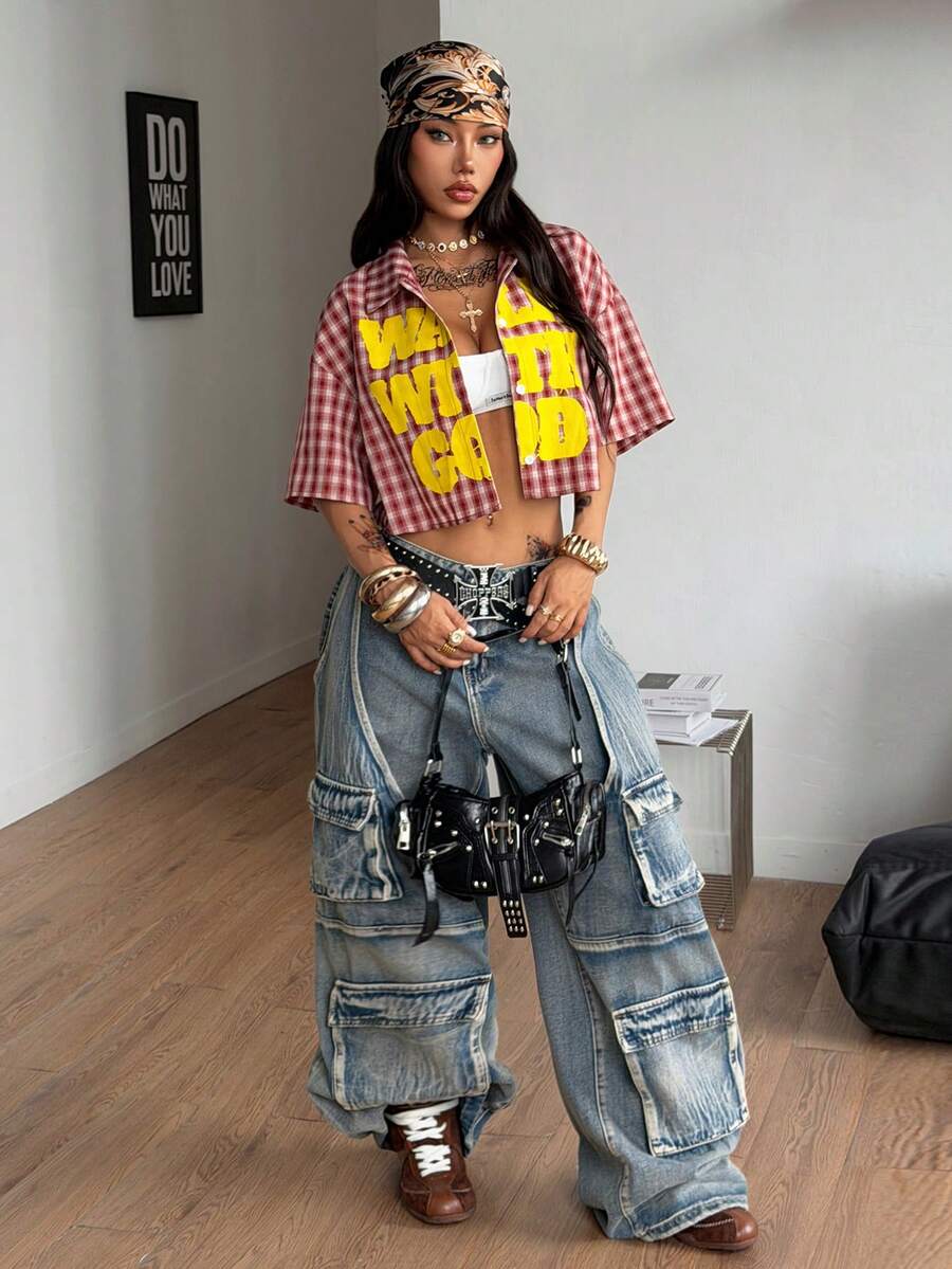Women's plaid crop shirt with button front, chest pocket, short sleeves, and loose casual fit.