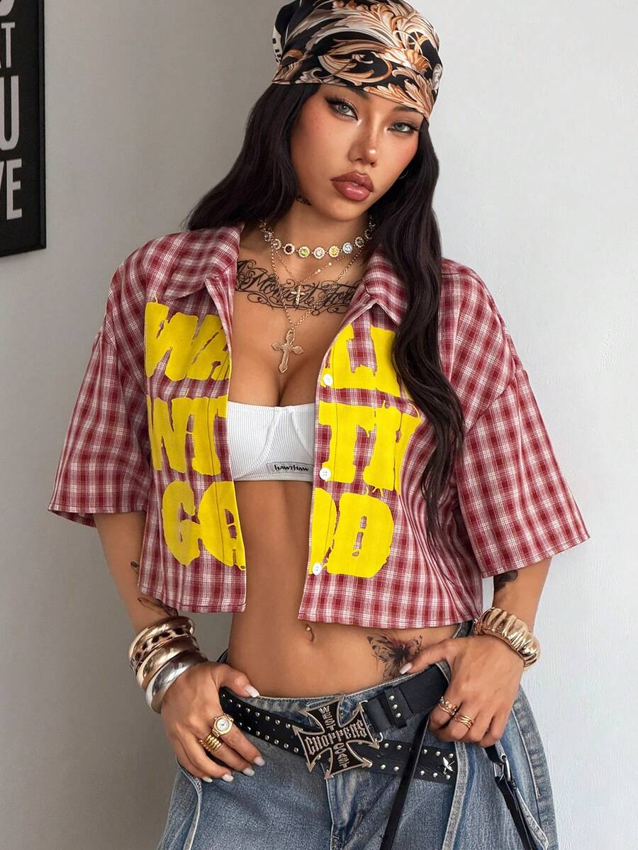 Women's plaid crop shirt with button front, chest pocket, short sleeves, and loose casual fit.