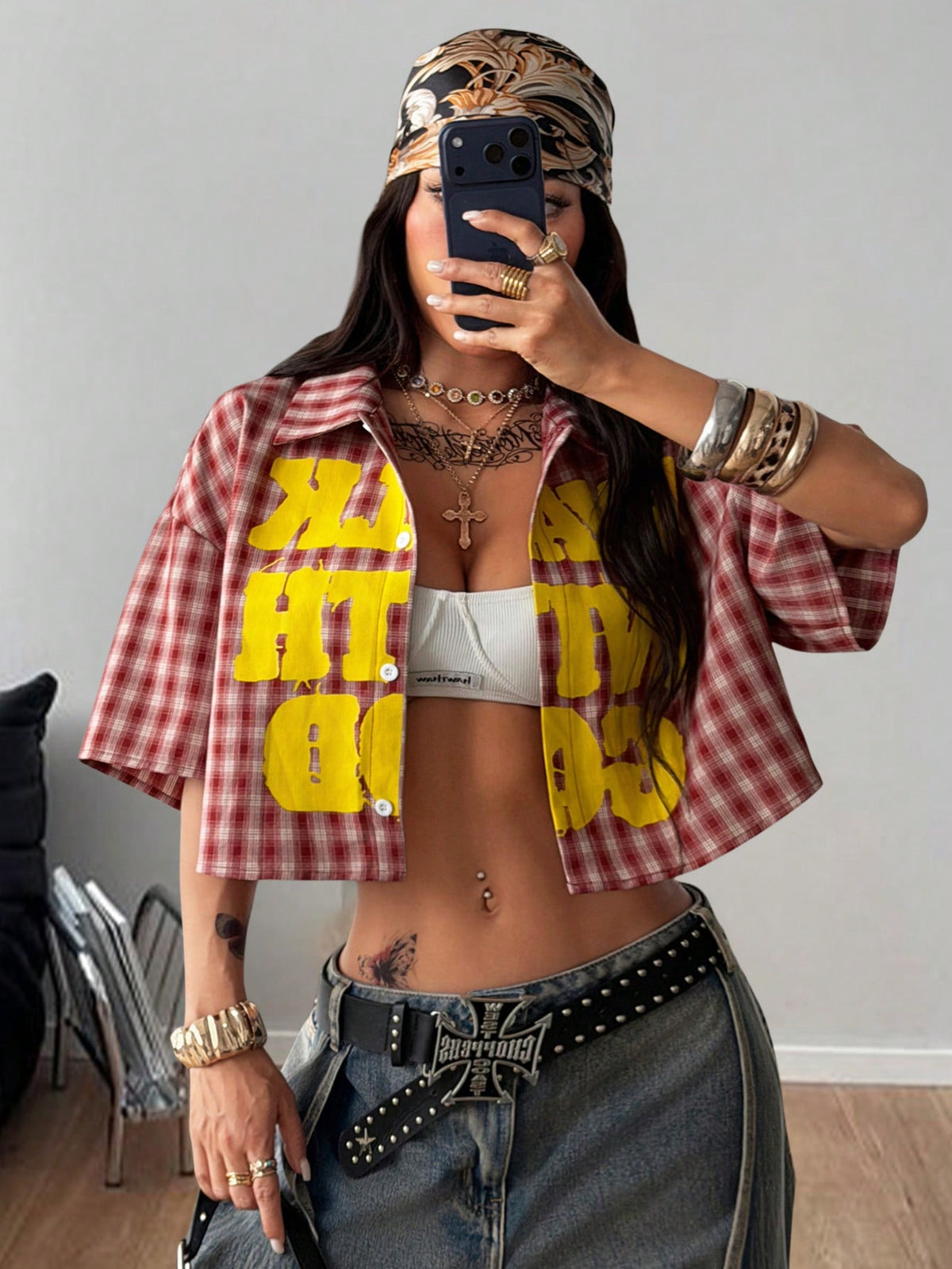 Women's plaid crop shirt with button front, chest pocket, short sleeves, and loose casual fit.