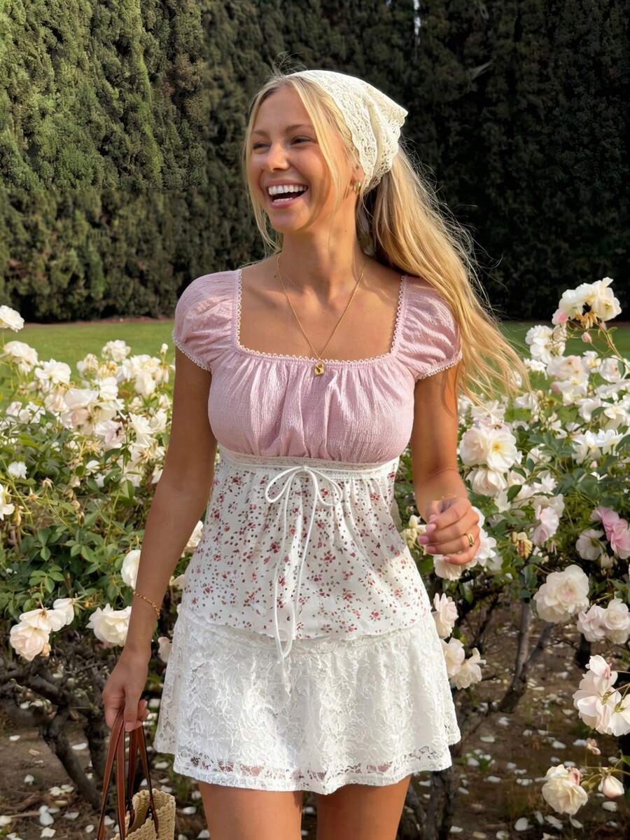 White ditsy floral women's square neck short sleeve t-shirt featuring puff sleeves, frill details, and a slim fit flared hem.