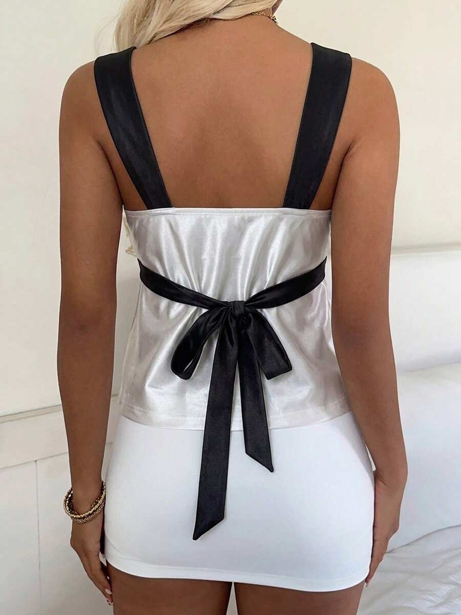 Women's multicolor shiny satin geometric splice camisole with square neckline, wide straps, studded details, slim fit, and open back tie design
