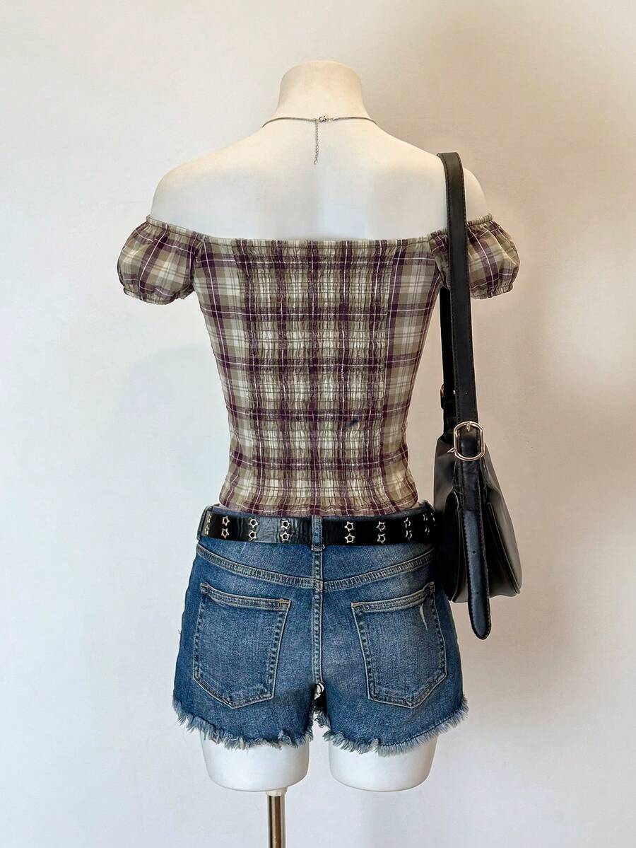 Women's army green plaid off-the-shoulder shirt with short puff sleeves, front button closure, flared hem, and lace-up grommet eyelet details.