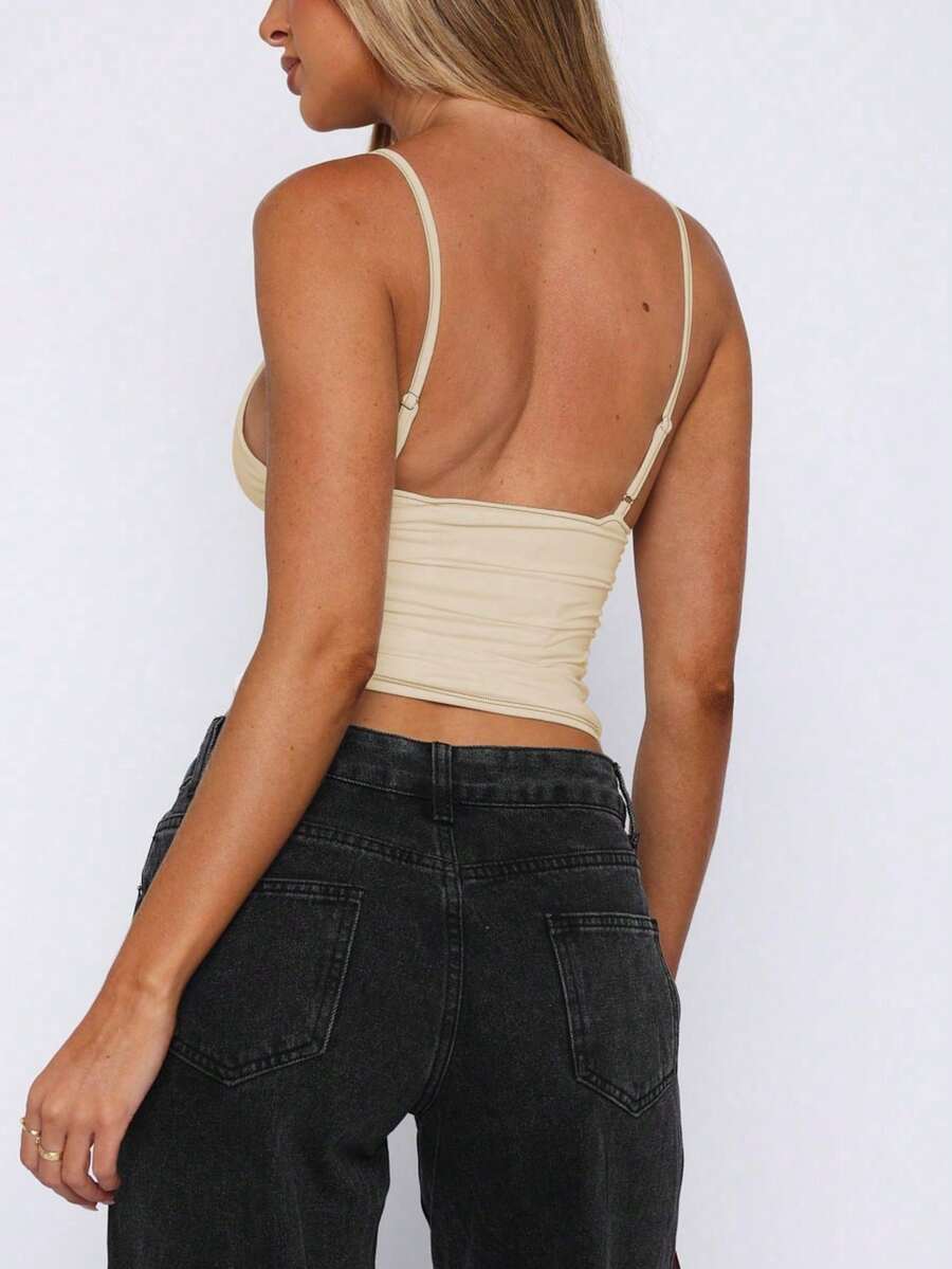 Women's red V-neck backless cami crop top with ruched details in a slim fit knitted style.