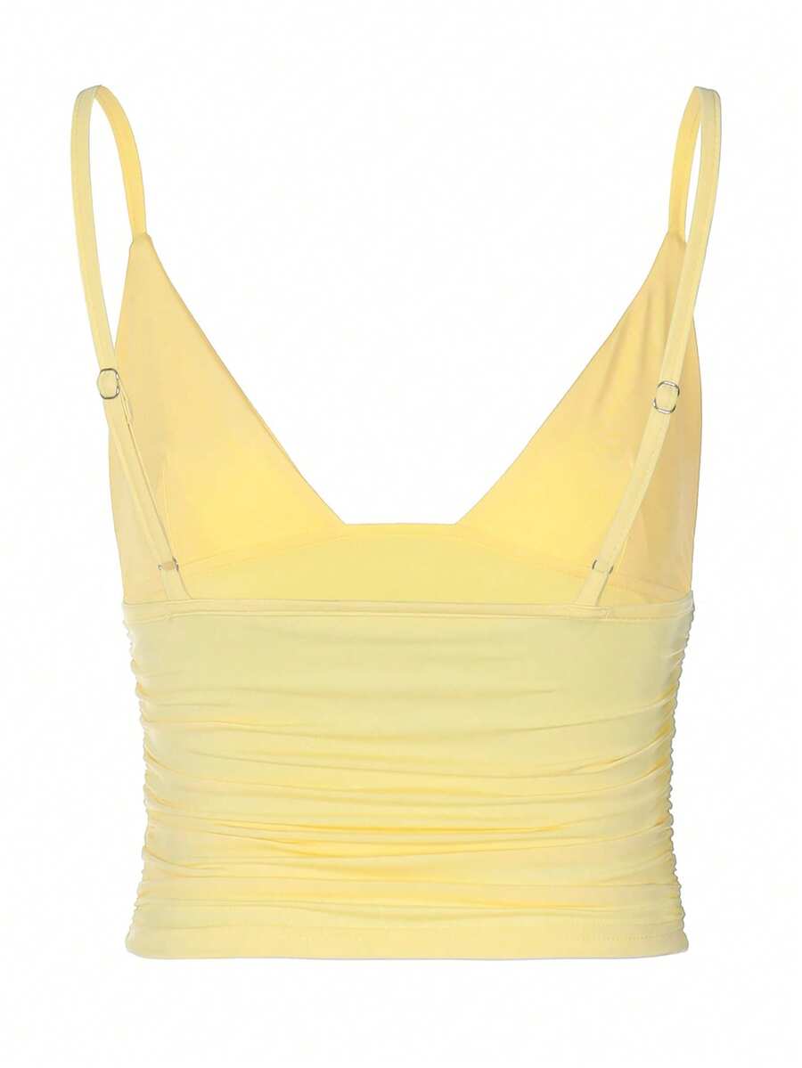 Women's red V-neck backless cami crop top with ruched details in a slim fit knitted style.