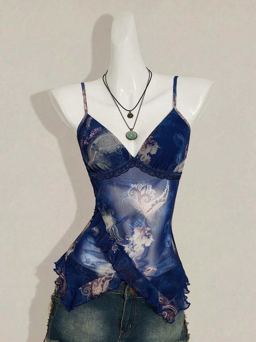 Women's graphic print camisole top featuring thin spaghetti straps, a backless cut, and an asymmetrical hem.