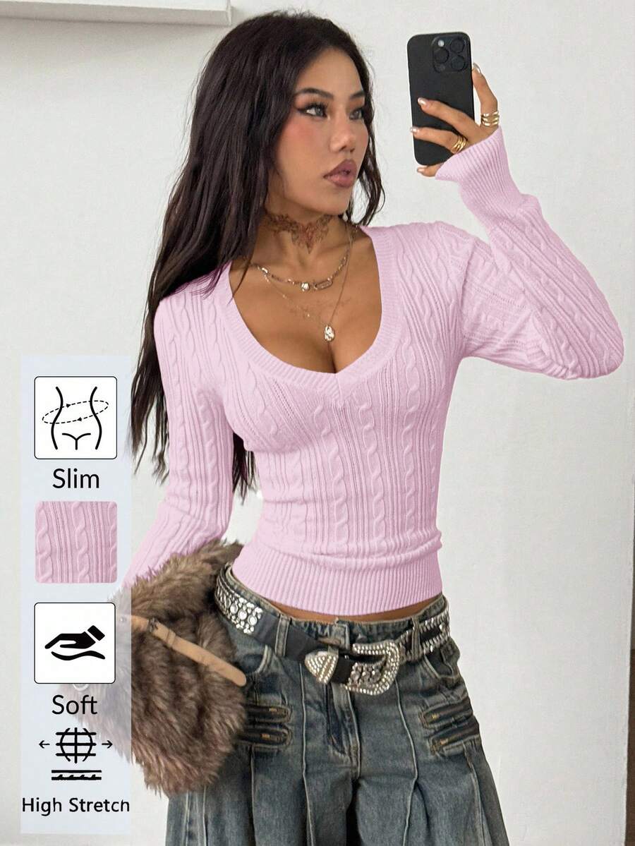 Women's slim fit cable-knit sweater with a V-neckline and long sleeves in solid green rib knit fabric.