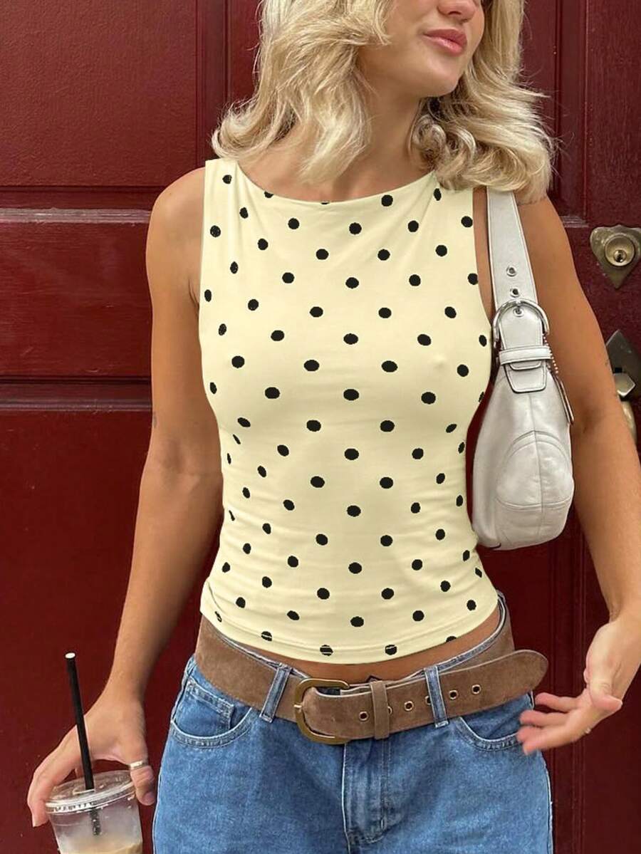 Women's polka dot sleeveless tank top with round neck, ruched rib-knit detail, regular hem, and slim fit casual style
