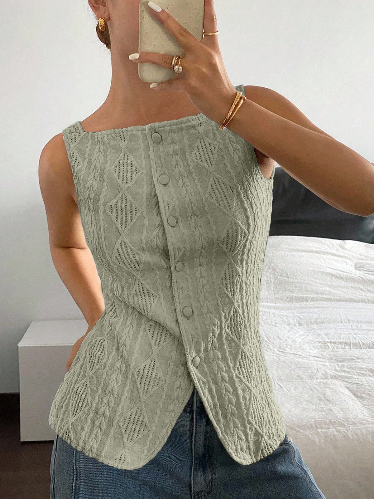 Striped ribbed knit tank top for women featuring a button-down front, sleeveless design, and slim fit silhouette.