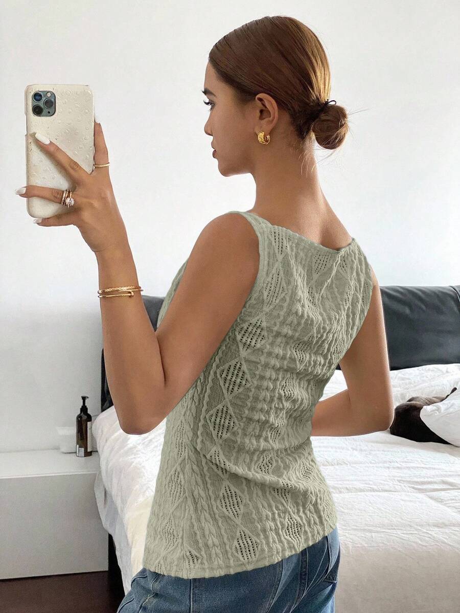 Striped ribbed knit tank top for women featuring a button-down front, sleeveless design, and slim fit silhouette.