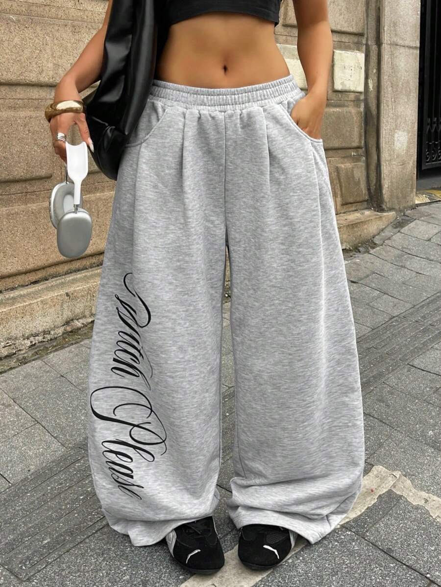 Women's loose straight leg casual pants with drawstring elastic waist and pockets