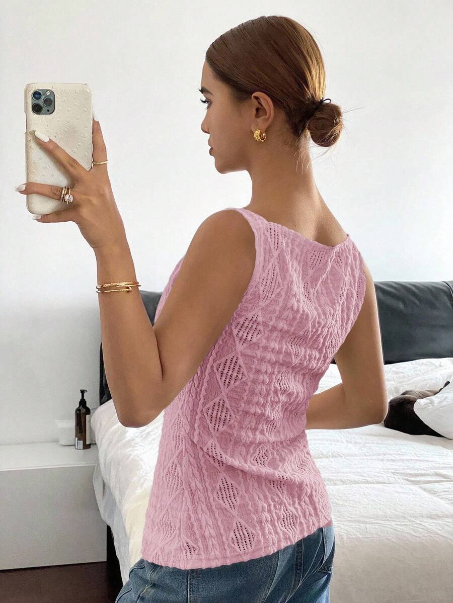 Striped ribbed knit tank top for women featuring a button-down front, sleeveless design, and slim fit silhouette.