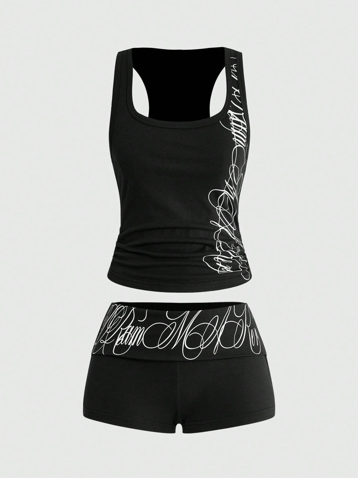 Punk-inspired two-piece set with a fitted scoop neck slogan tank top featuring cross and rhinestone details paired with ultra low waist mini shorts.