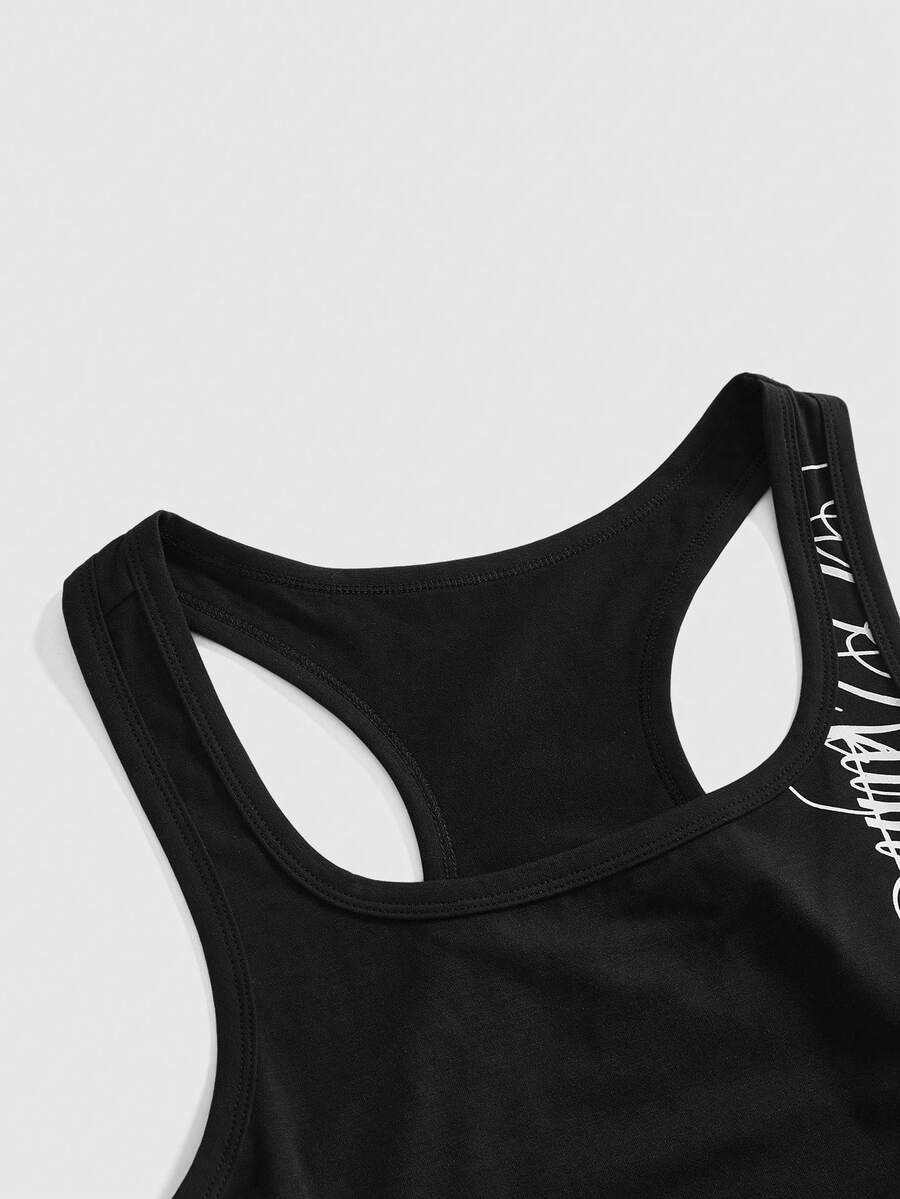 Punk-inspired two-piece set with a fitted scoop neck slogan tank top featuring cross and rhinestone details paired with ultra low waist mini shorts.