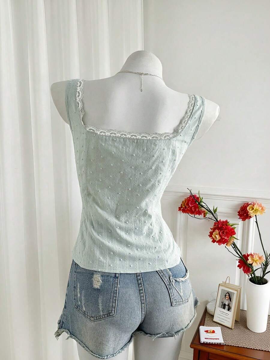 Women's 100% cotton sleeveless camisole top featuring a square neckline, wide straps, lace-up knot detail, and an asymmetrical hem.