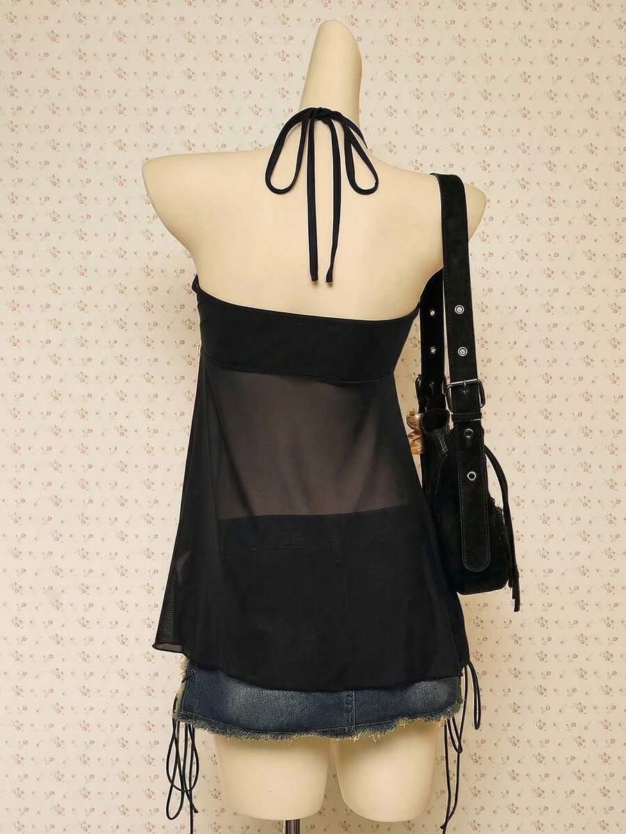 Women's boho halter mesh tank top with asymmetrical hem, semi-sheer finish, lined body, slim fit, and cold shoulder styling.