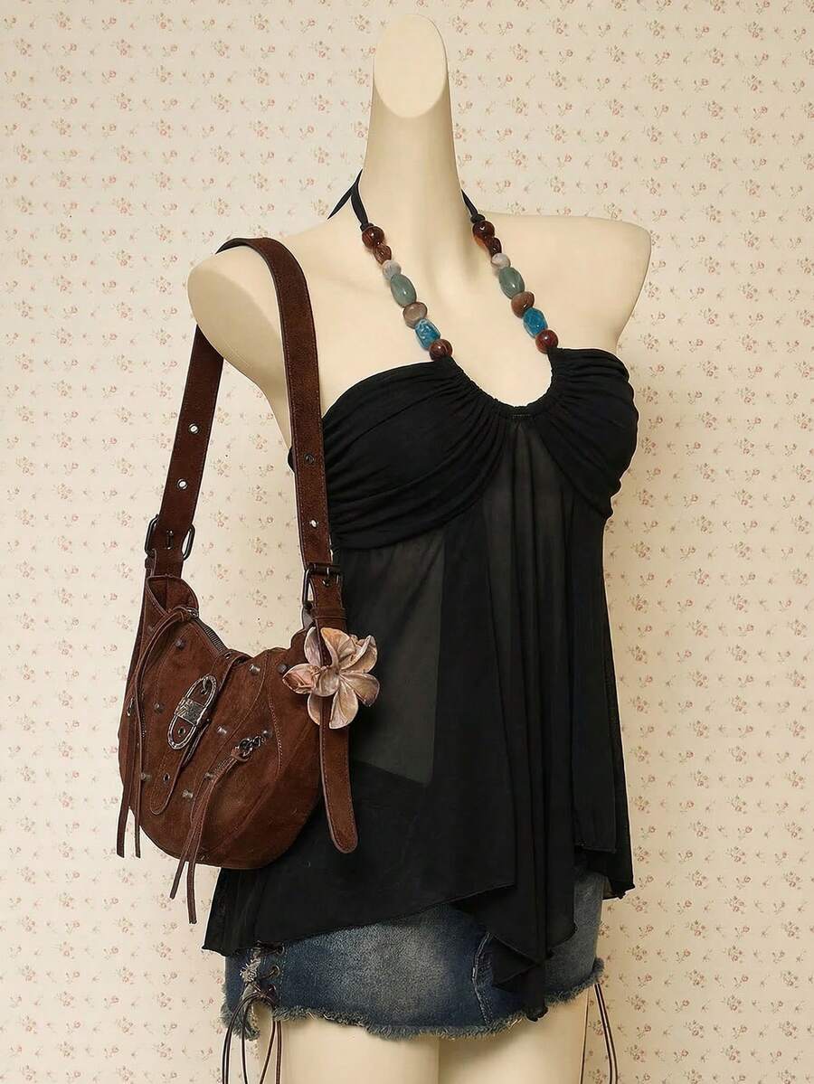 Women's boho halter mesh tank top with asymmetrical hem, semi-sheer finish, lined body, slim fit, and cold shoulder styling.