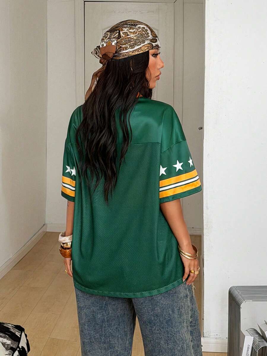 Green short sleeve graphic jersey t-shirt with V-neck and oversized fit