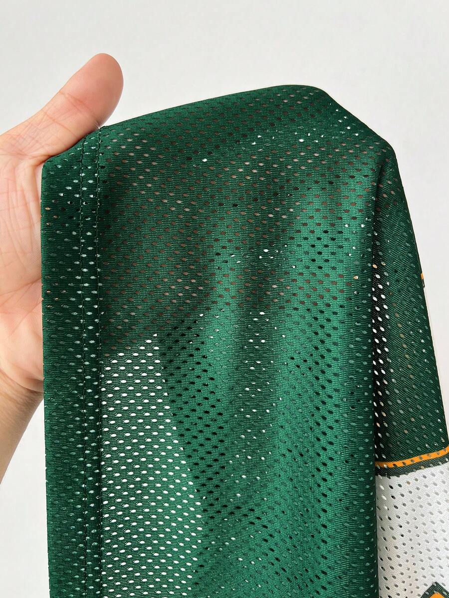 Green short sleeve graphic jersey t-shirt with V-neck and oversized fit