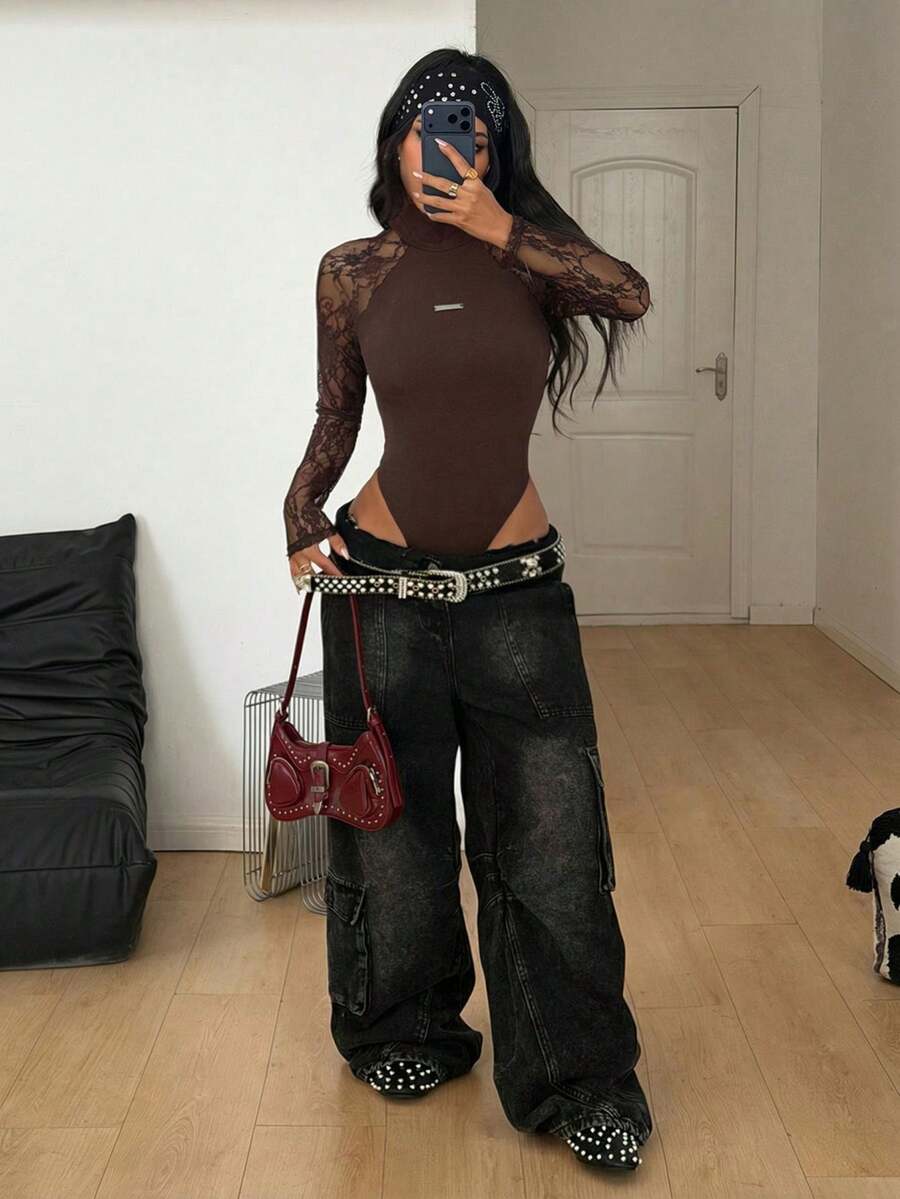 Women's slim fit lace bodysuit with extra-long sleeves, stand collar, and contrast sheer mesh details.