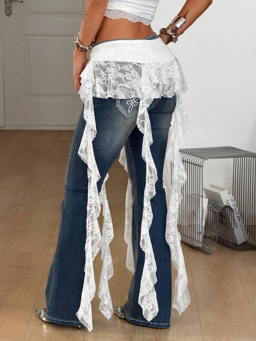 Women's black semi-sheer lace asymmetrical skirt with fringe details, contrast lace, low waist, and ruffle hem for beach, party, concert, or festival outfits.