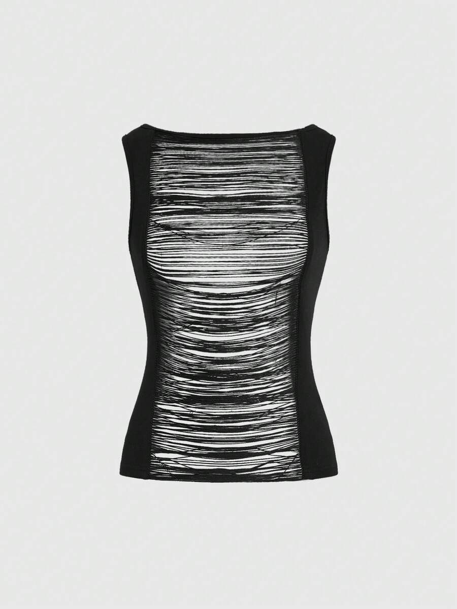Front view of women's round neck slim fit cotton knit camisole featuring fringe ripped hollow-out detailing.
