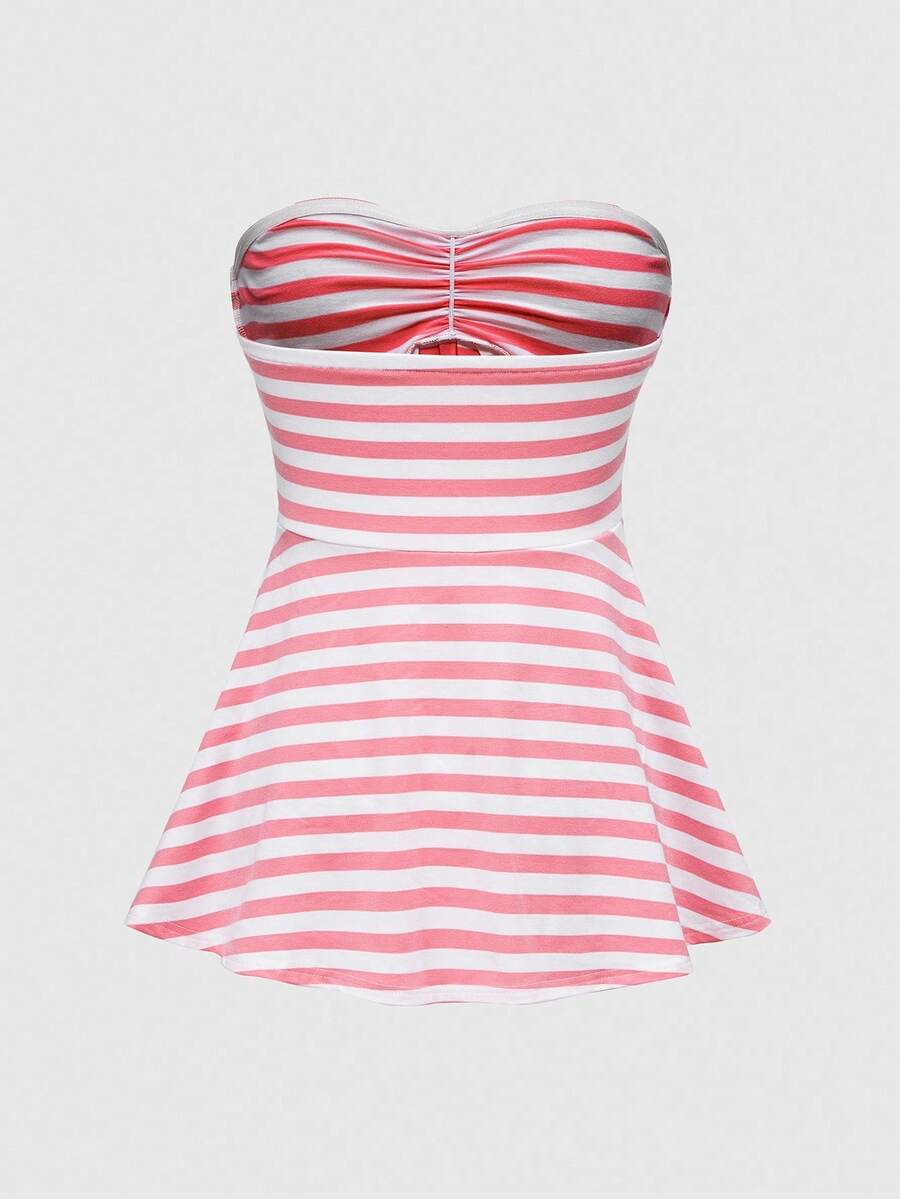 Women's striped strapless tube top featuring ruched detailing, flared hem, and stretchy knit fabric.