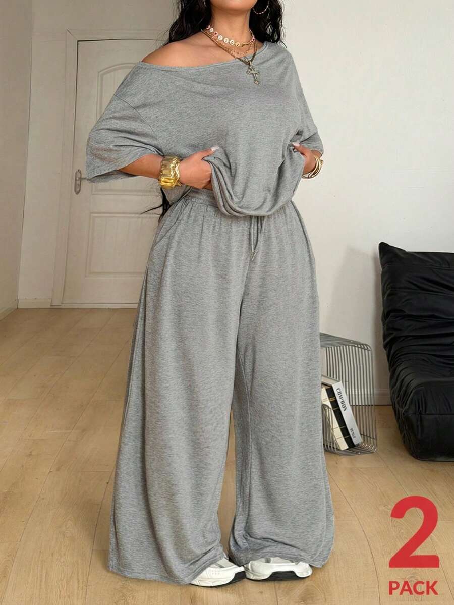 Women's two-piece lounge set featuring a loose drop shoulder asymmetrical neck short sleeve t-shirt and wide-leg knit pants with pockets.